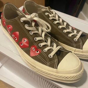 Brown Converse sneakers with hearts